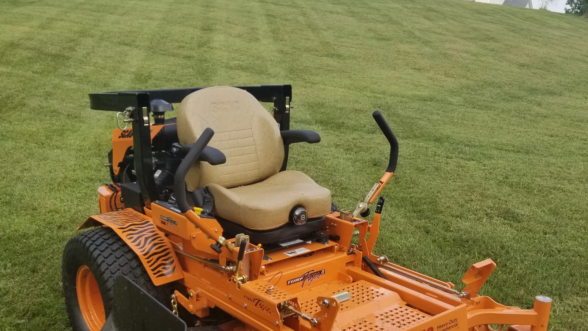 Lawn mower on a freshly cut residential lawn