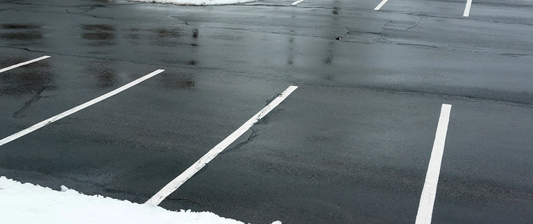 Commercial parking lot cleared of snow and ice