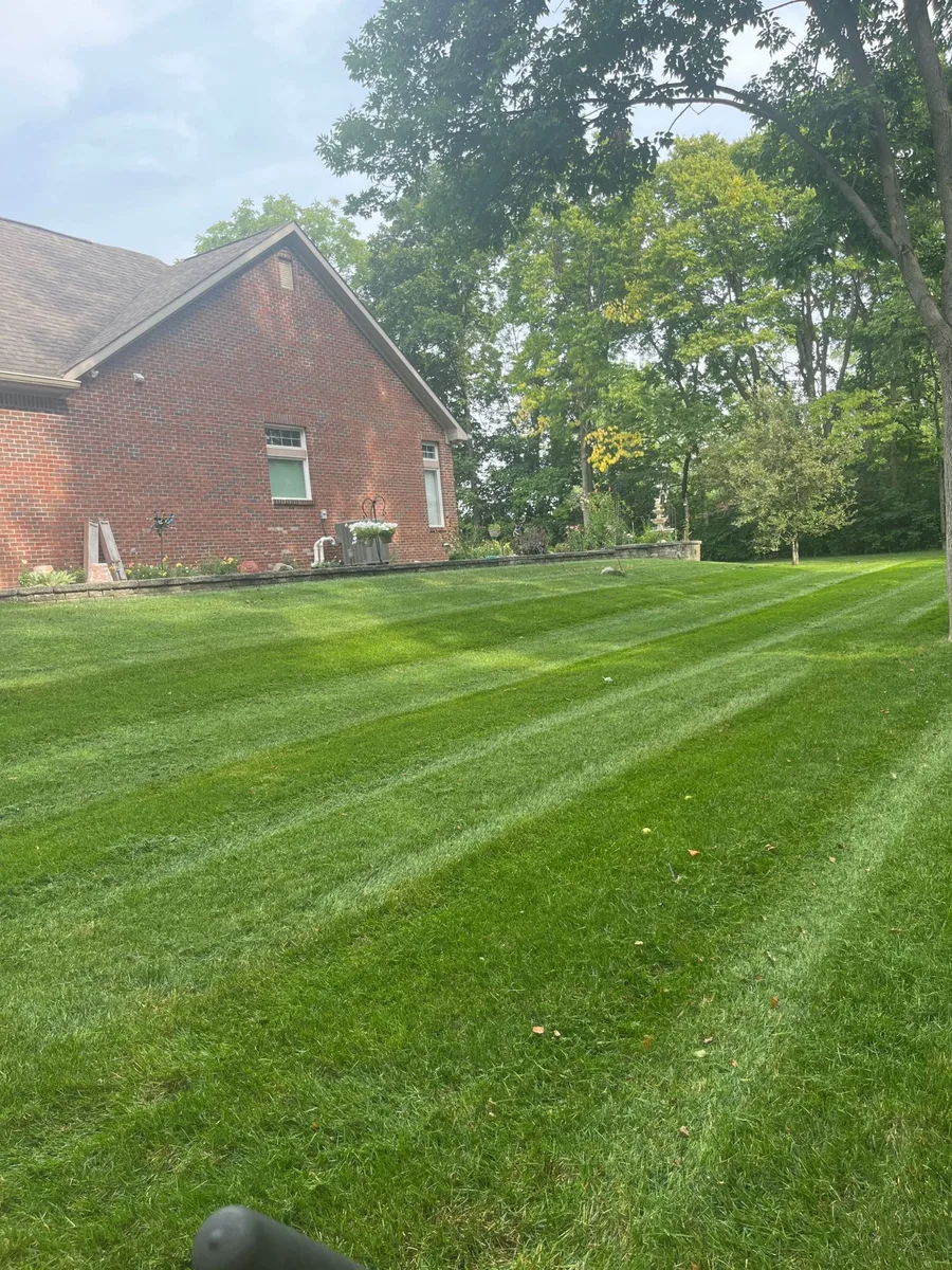 Striped lawn at a brick home in Hamilton County